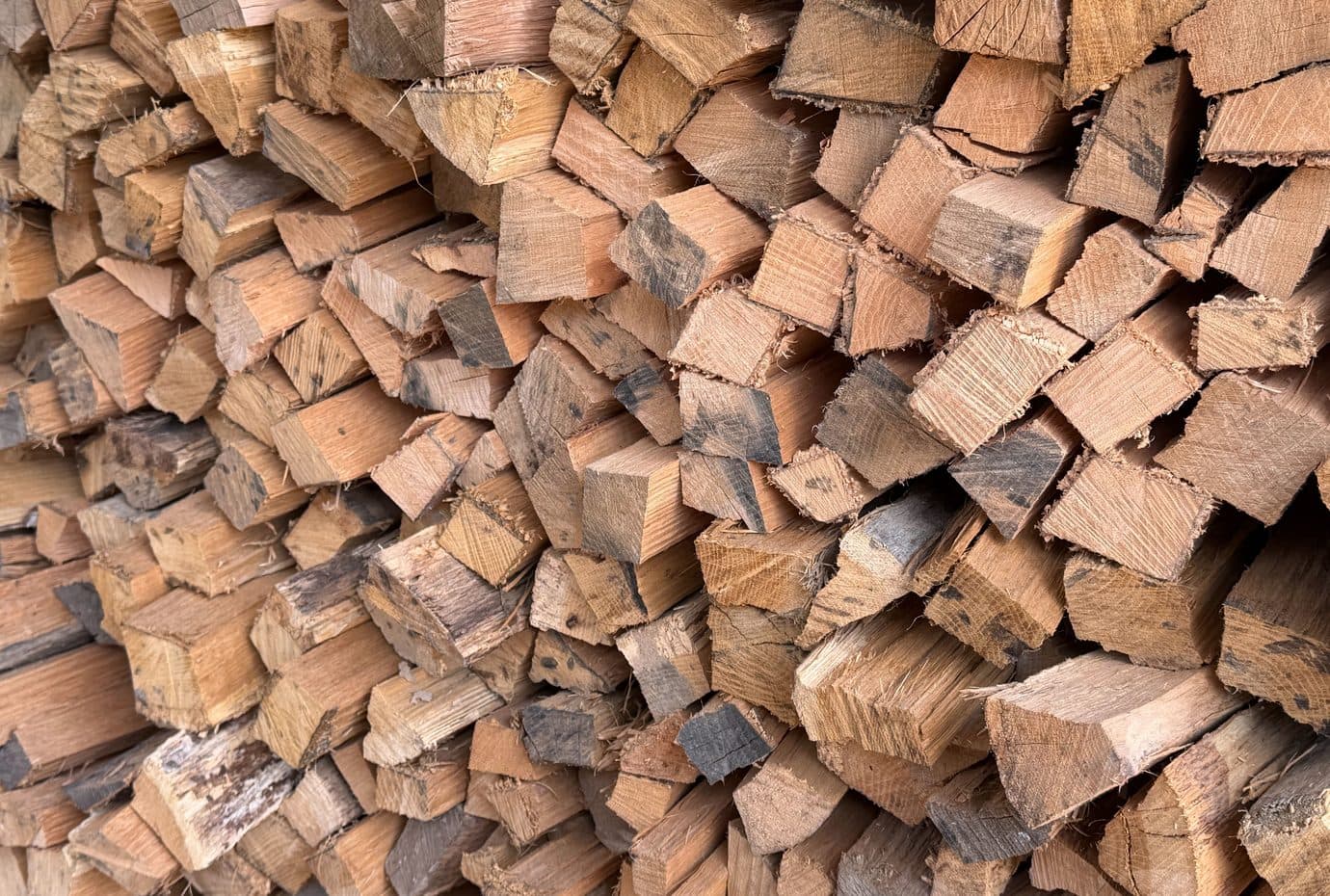 Stacked split firewood — Crossroads Firewood Co.